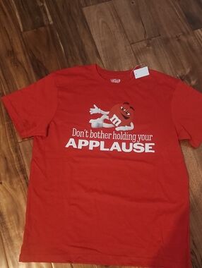 NEW from The M&M Store In VEGAS. Red Graphic Tee with White Applause Slogan